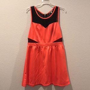 Pink party dress with black lace accents